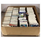 Box of assorted baseball and football cards