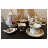 2 teapots, cups/saucer, teabag holder, sugar/cream