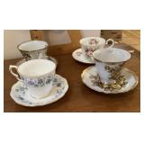 4 porcelain cups and saucers