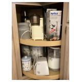 Contents of bottom corner kitchen cabinet