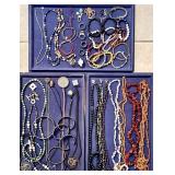 Costume beaded necklaces, bracelets, rings, etc.