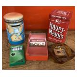 Empty tobacco containers, ashtray, postbox bank