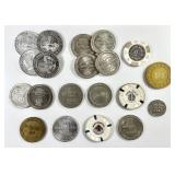 20 assorted vintage casino tokens
