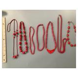 Collection of red beaded costume necklaces