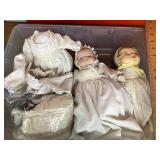 3 Baby dolls and clothes with tote