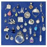 Large lot of costume jewelry pendants & charms