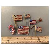Collection of American flag pins brooches