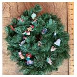 Christmas wreath with mini Hallmark ornaments