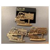 Collection of real estate brooches signed AJC