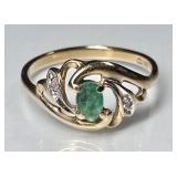 14k gold ring with green stone