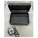Metal box with vintage Kodak camera