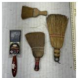 Hand brooms and paintbrush