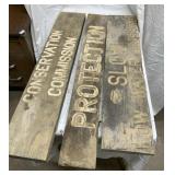3 wooden signs
