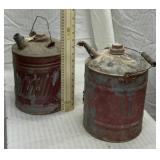 2 red vintage gas/oil cans