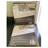 2 NEW handy hanger keepers