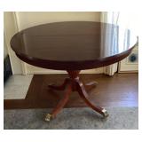 44' round mahogany table