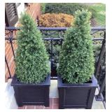 Pair of plastic planter boxes with faux trees