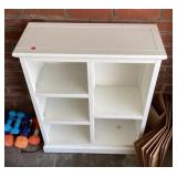 Small open storage cabinet
