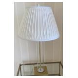 Clear glass and gold tone table lamp