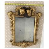 Ornate cherub wall mirror