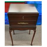 Silverware chest on table