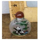 Reverse painted snuff bottle