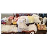 Table linens, doilies, aprons, hot pads, etc.