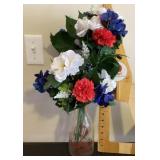 Vintage milk bottle with artificial flowers