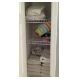 Contents of hallway bath linen closet