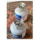 2 empty propane tanks