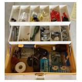 Tackle box of home repair electrical hardware