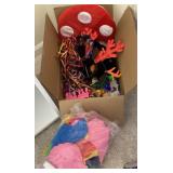 Box of costumes and party favors