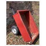 Garden cart behind shed