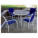 4 patio chairs and round metal mesh table