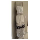 Vintage wooden ladder with blankets