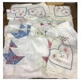 Collection of embroidered and patchwork squares