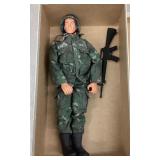 G.I. Joe action figure with gun