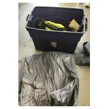 Tub of scuba gear and air mattress