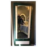 Mirror in old door frame