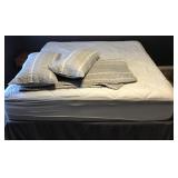 King size bed with bedding