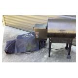 Traeger wood pellet grill with cover