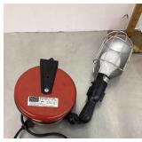 Drop light on retractable reel