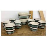 Pottery pitcher and 8 cups