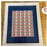 Framed sheet of Elvis postage stamps