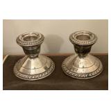 Weighted sterling candleholders