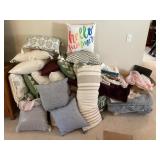 Large group of soft goods and pillows