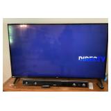 65" LG TV with remote