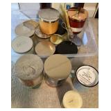 Tote of new and used candles
