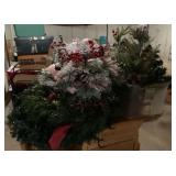 Holiday wreaths and tote of greenery