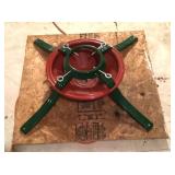 Christmas tree stand mounted to board